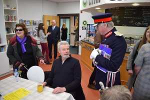 Lord-Lieutenant Simpson speaking with some visitors by the cafe. 